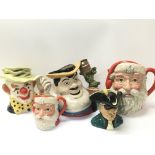 A collection of Royal Doulton character jugs inclu