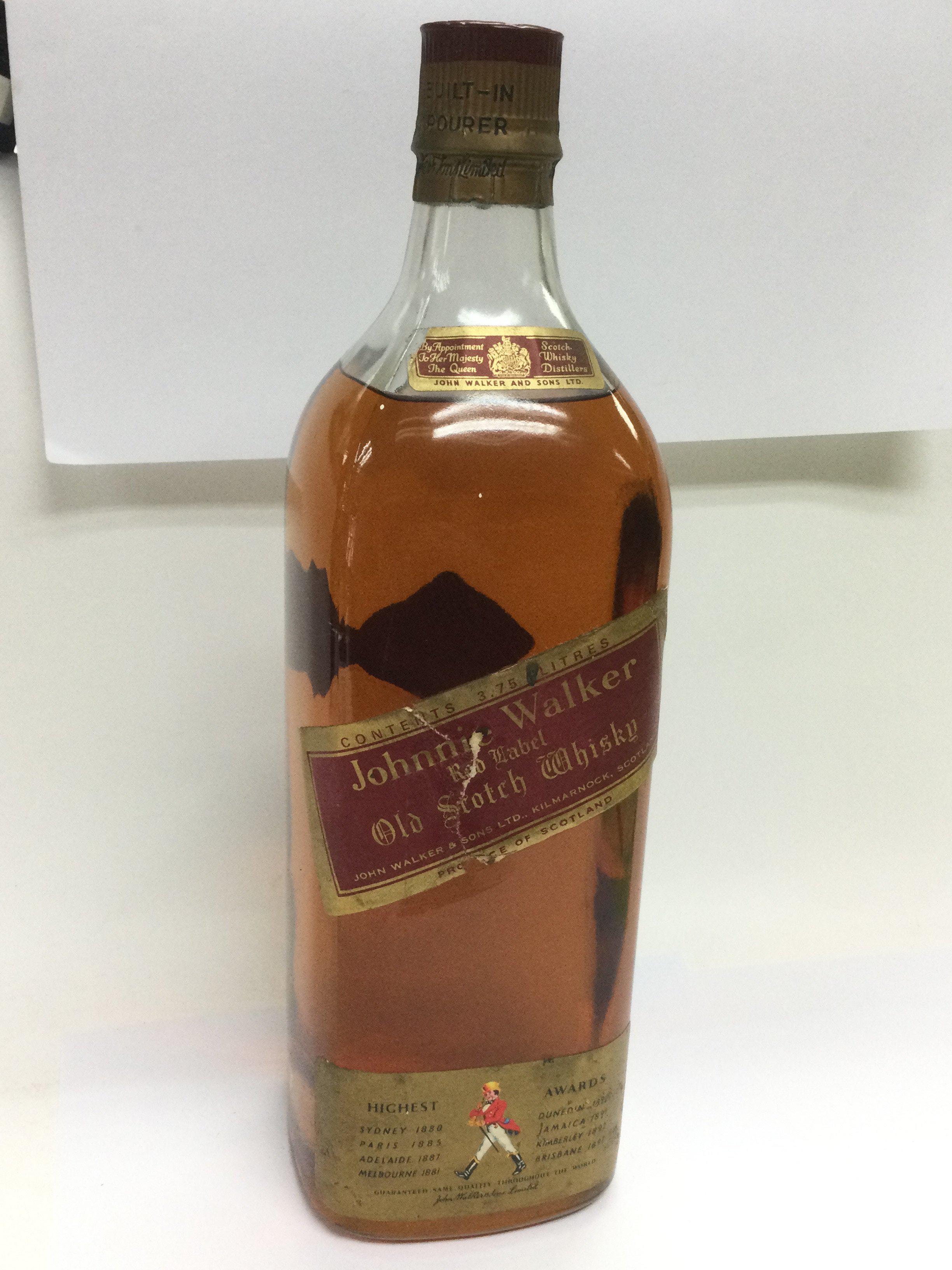 A 3.75l bottle of Johnnie Walker Red Label whisky.