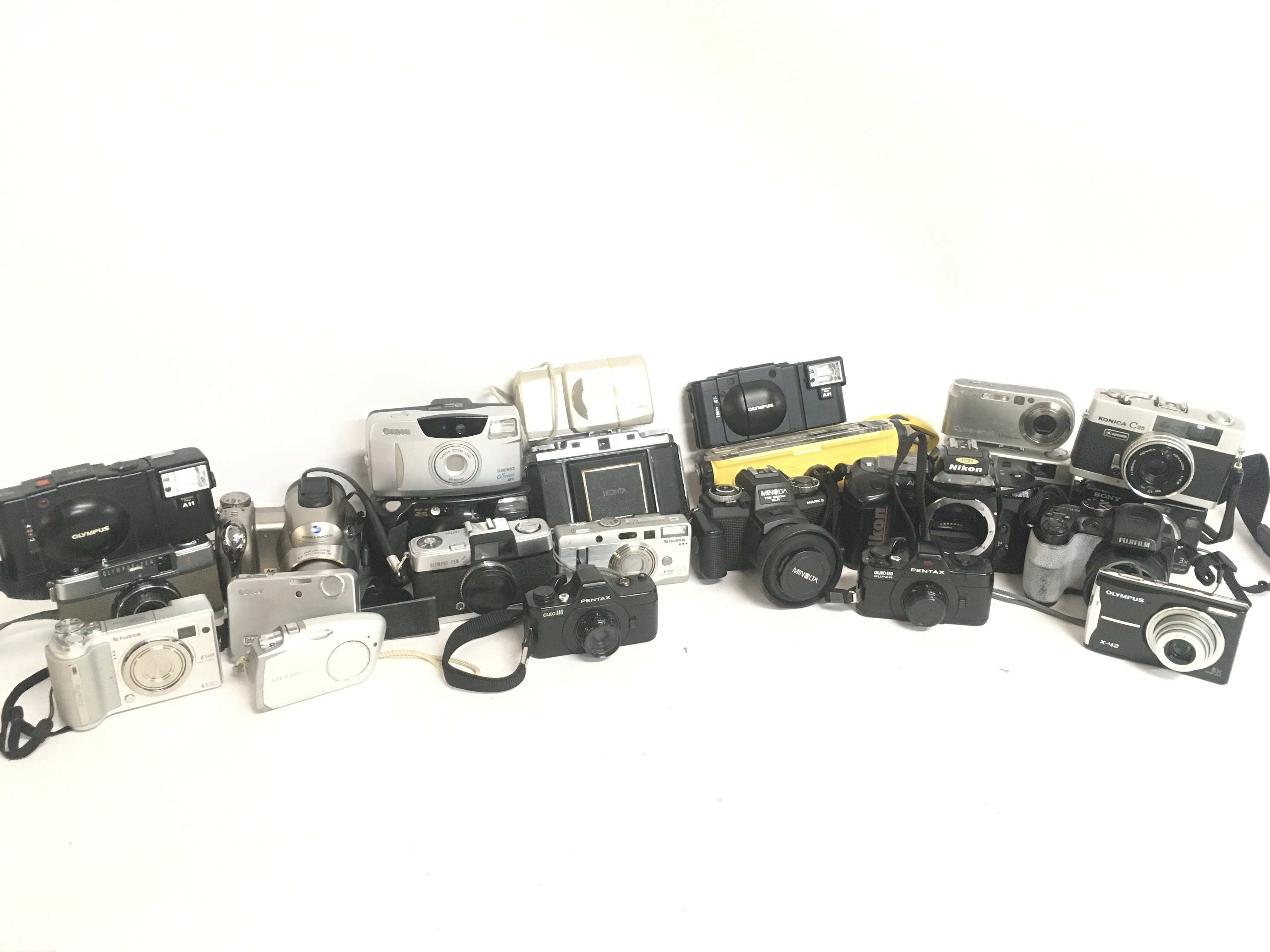 Vintage cameras including Olympus, Pentax, Minolta