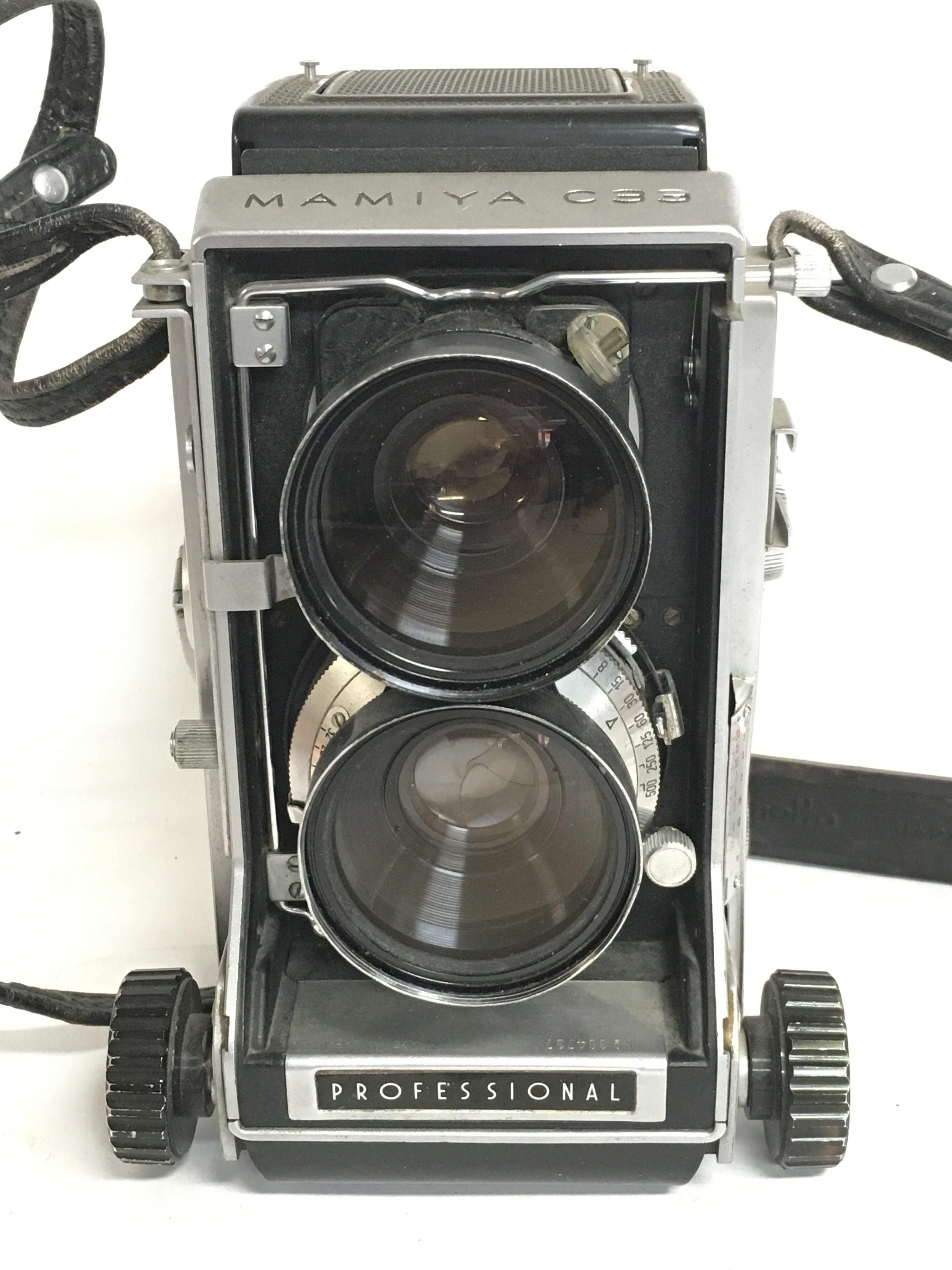 A vintage Mamiya C33 professional camera fitted wi