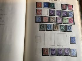 A collection of seven albums of mixed world stamps