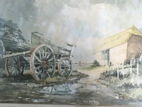 A large and well presented framed watercolour rural study with a farm cart and buildings. Signed