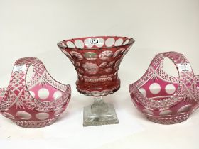 A pair of cut glass and red flash baskets and a si