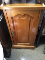 A satin walnut bedside cabinet. approx 77cmx41cm.