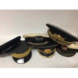 A collection of Navy Hats including Russian office