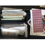 A box containing stamp albums presentation packs a