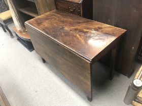 An Edwardian Satinwood sideboard with two bow fron