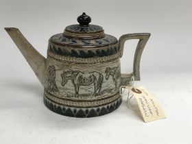 A Royal Doulton Hannah Barlow tea pot decorated wi