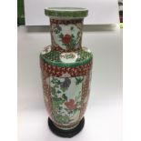 A pn Oriental vase decorated with birds and flower