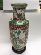 A pn Oriental vase decorated with birds and flower