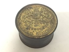 A rare shotgun central fire caps brass lidded box