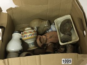 A box containing 17th century stoneware Bellarmine