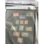 A box containing a large quantity of world stamp w