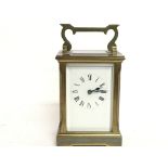 A brass carriage clock, this lot cannot be posted