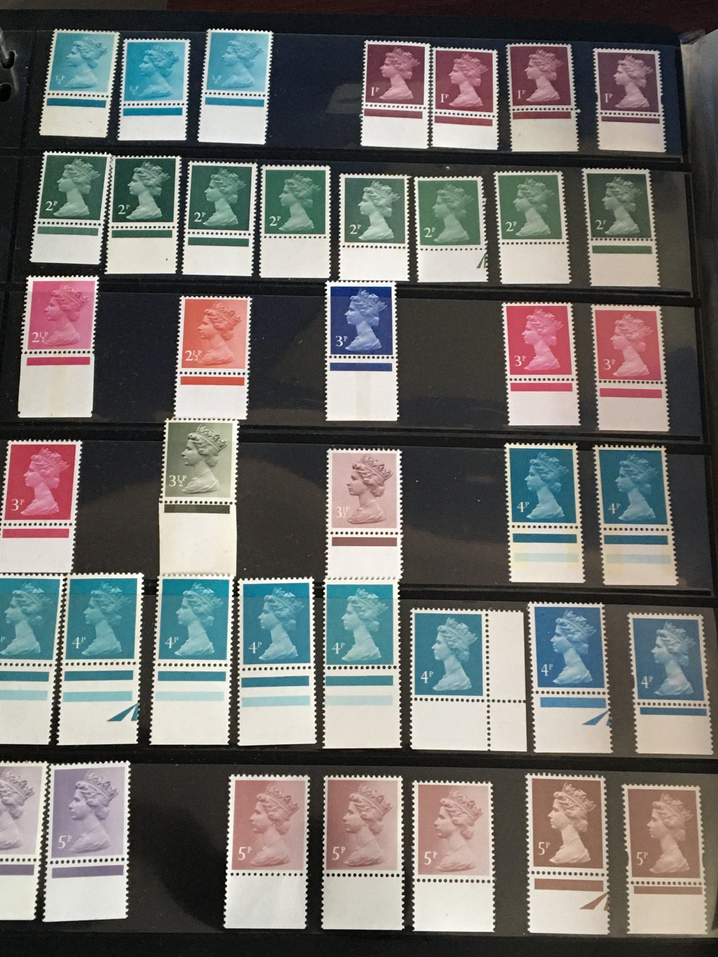 Seven albums containing world stamps including an