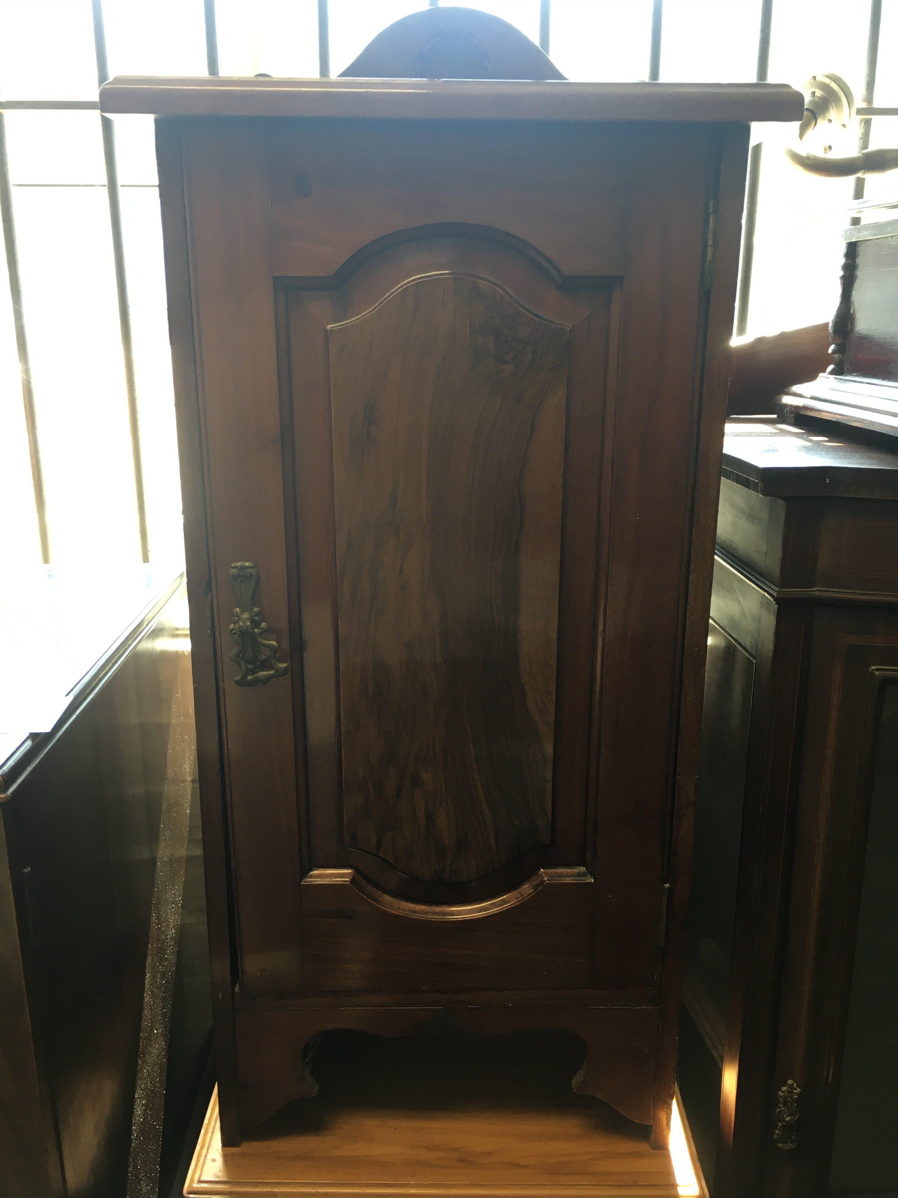 A walnut bedside cabinet. Approx 77cm x 40cm