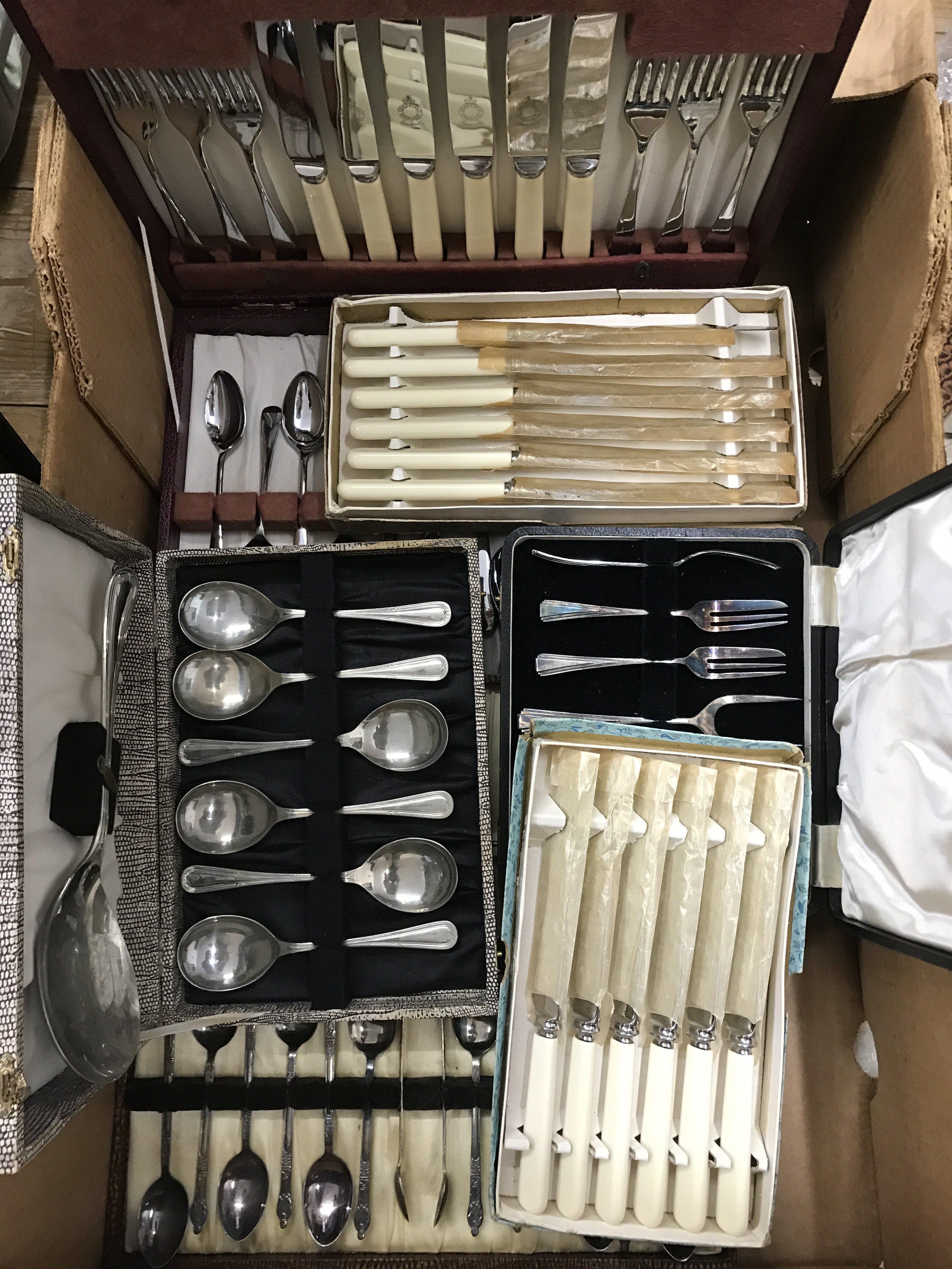 Box of mixed metalware and cased cutlery sets