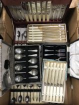 Box of mixed metalware and cased cutlery sets