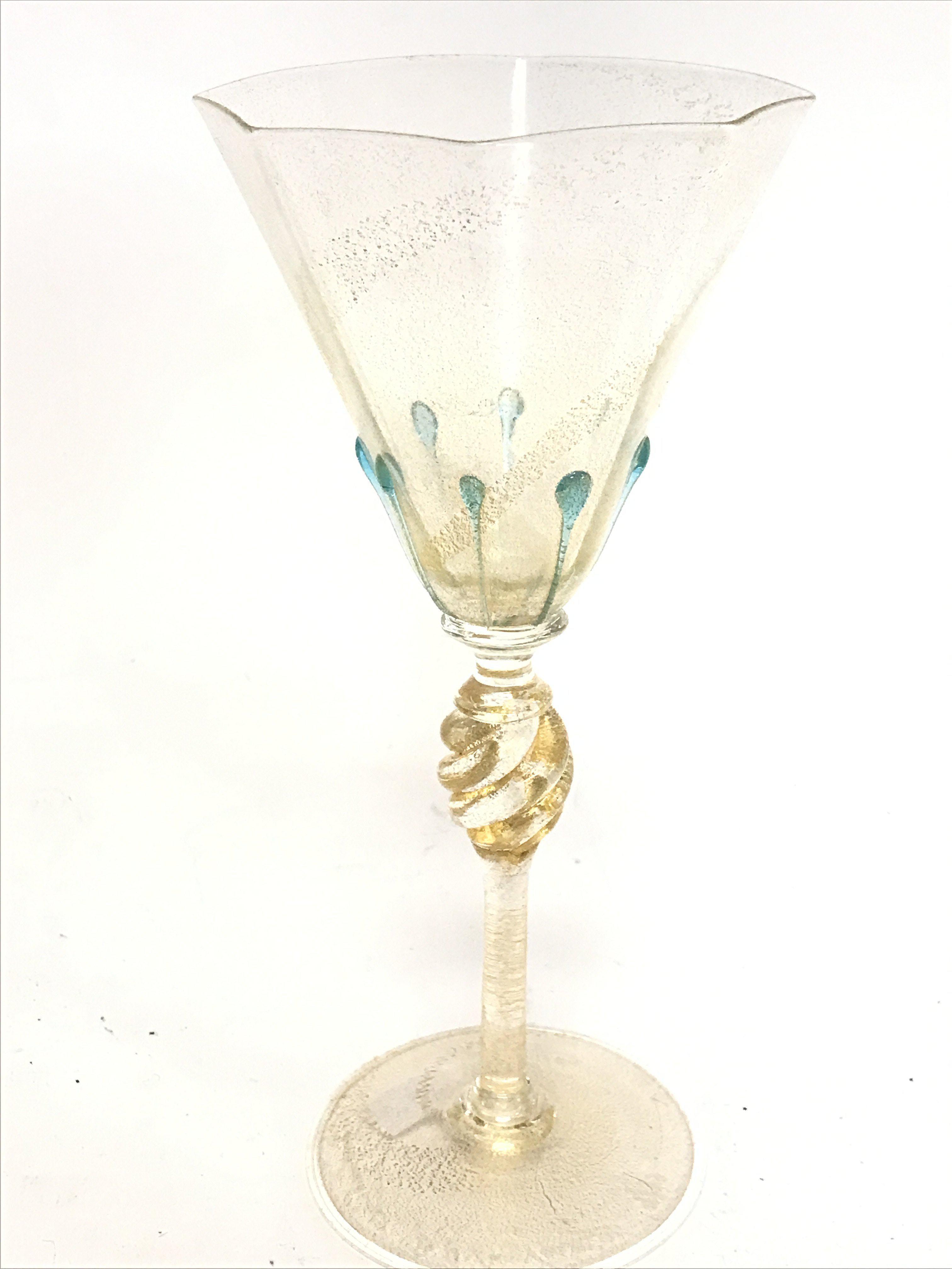 A Signed Murano wine glass with gold fleck inclusi