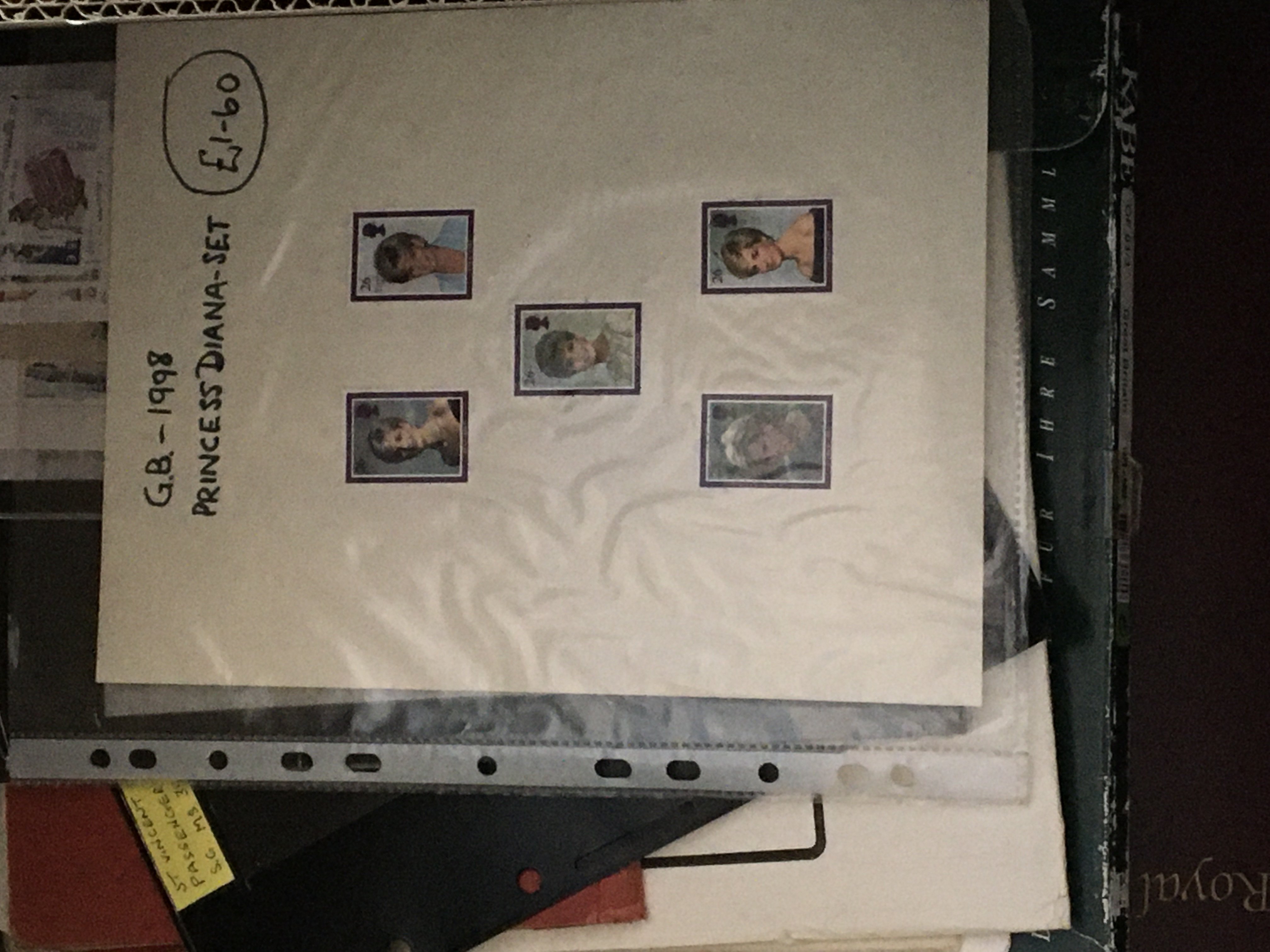 A box containing a large quantity of philatelic re