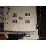 A box containing a large quantity of philatelic re