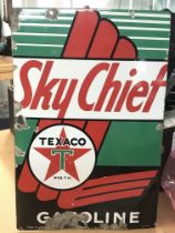 A vintage American enamelled sign for sky chief ga
