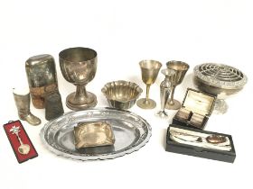 A collection of silver plate including a novelty b