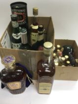 Two boxes of alcohol including various whiskies. S