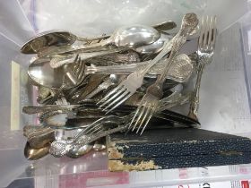 A collection of cutlery including knives, forks and spoons. Postage category C