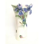 A Franz porcelain humming bird with blue orchids v