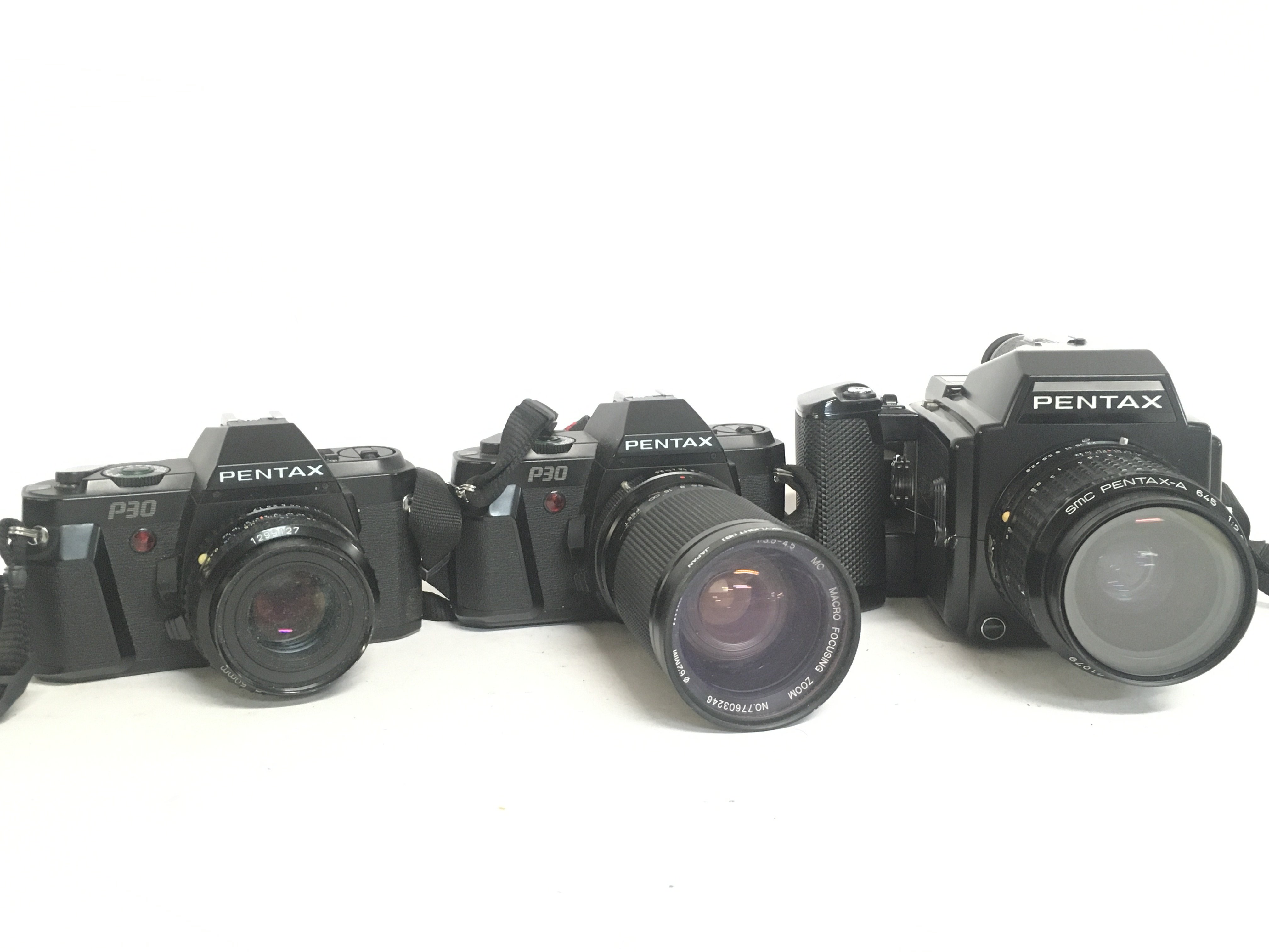 Vintage Pentax cameras including a Pentax 645, and