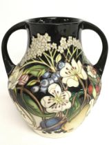 A Moorcroft Nicola Slaney two handled vase , 17.5c