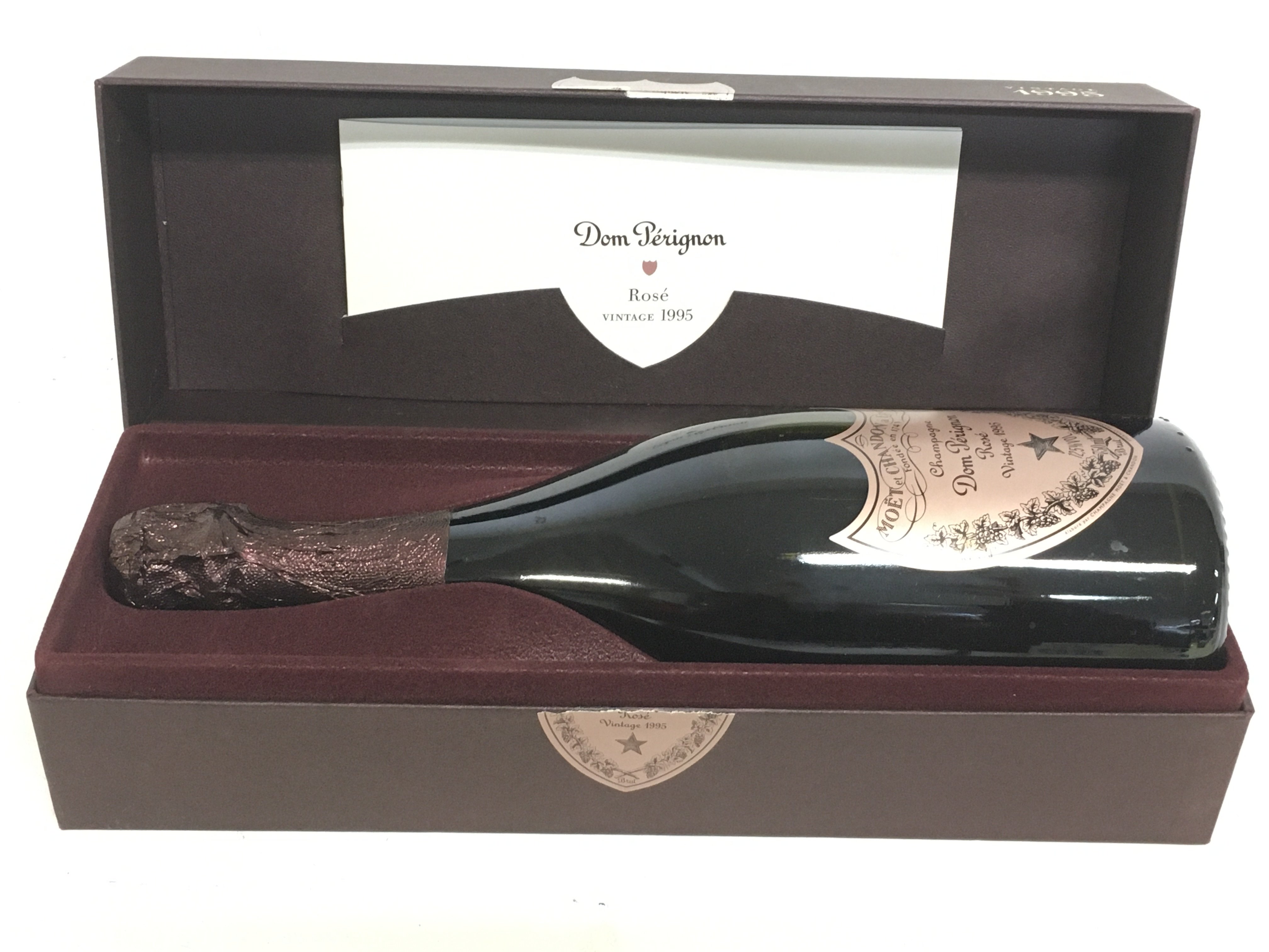 A boxed bottle of Dom Perignon rose 1995. This lot