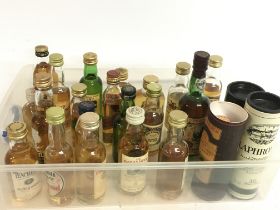 A collection of Whisky miniatures including Pigs N