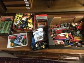 A collection of assorted playworn and boxed die cast including corgi Dinky and Britain's.