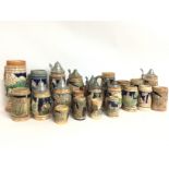 A large collection of German Stein jugs and tankar