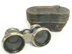 A pair of cased French Field and Marine binoculars