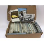 A box of vintage postcards. Shipping category C.