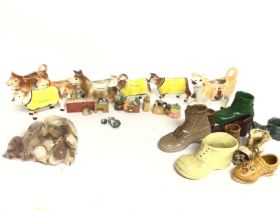 A collection of ceramics including Jersey cows, bo