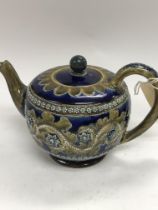 A Royal Doulton George Tinworth teapot decorated w