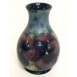 A Moorcroft vase, 12cm tall. No obvious damage or