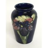 A small Moorcroft vase, 9.5cm tall. No obvious dam