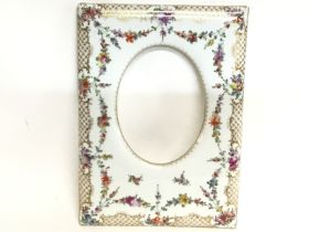 A Dresden porcelain portrait holder, 18x26cm. this