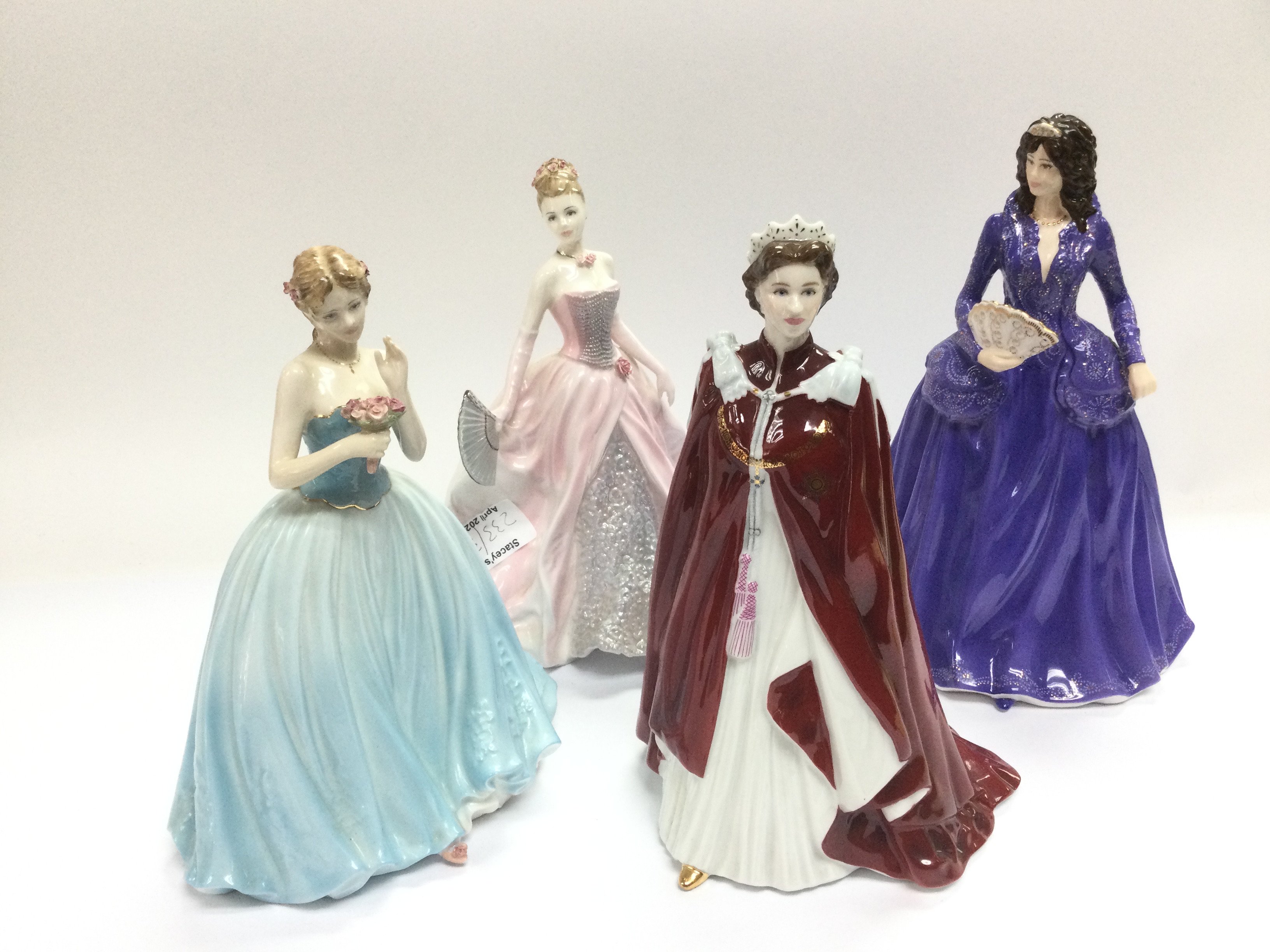 Four figures of ladies comprising Coalport and Roy