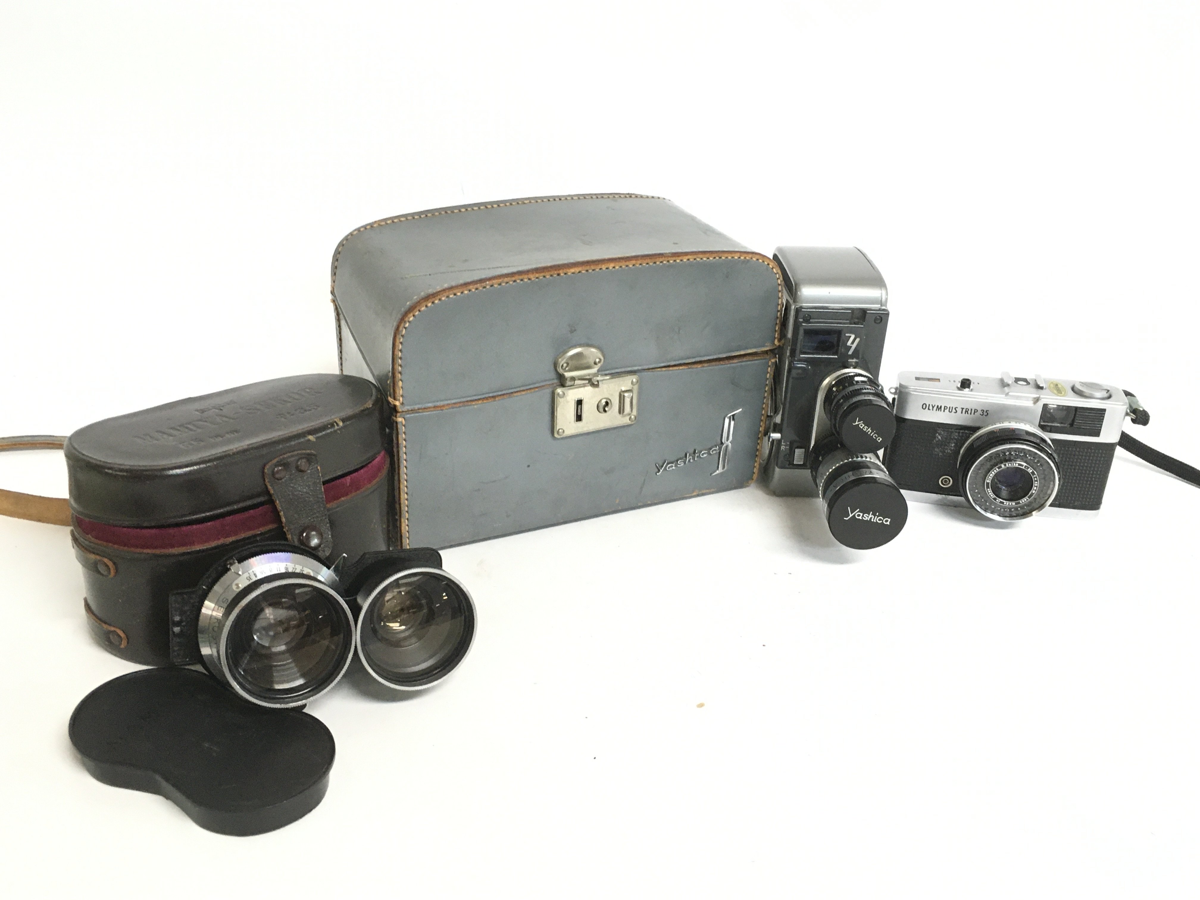 Vintage cameras and accessories including a Yashic