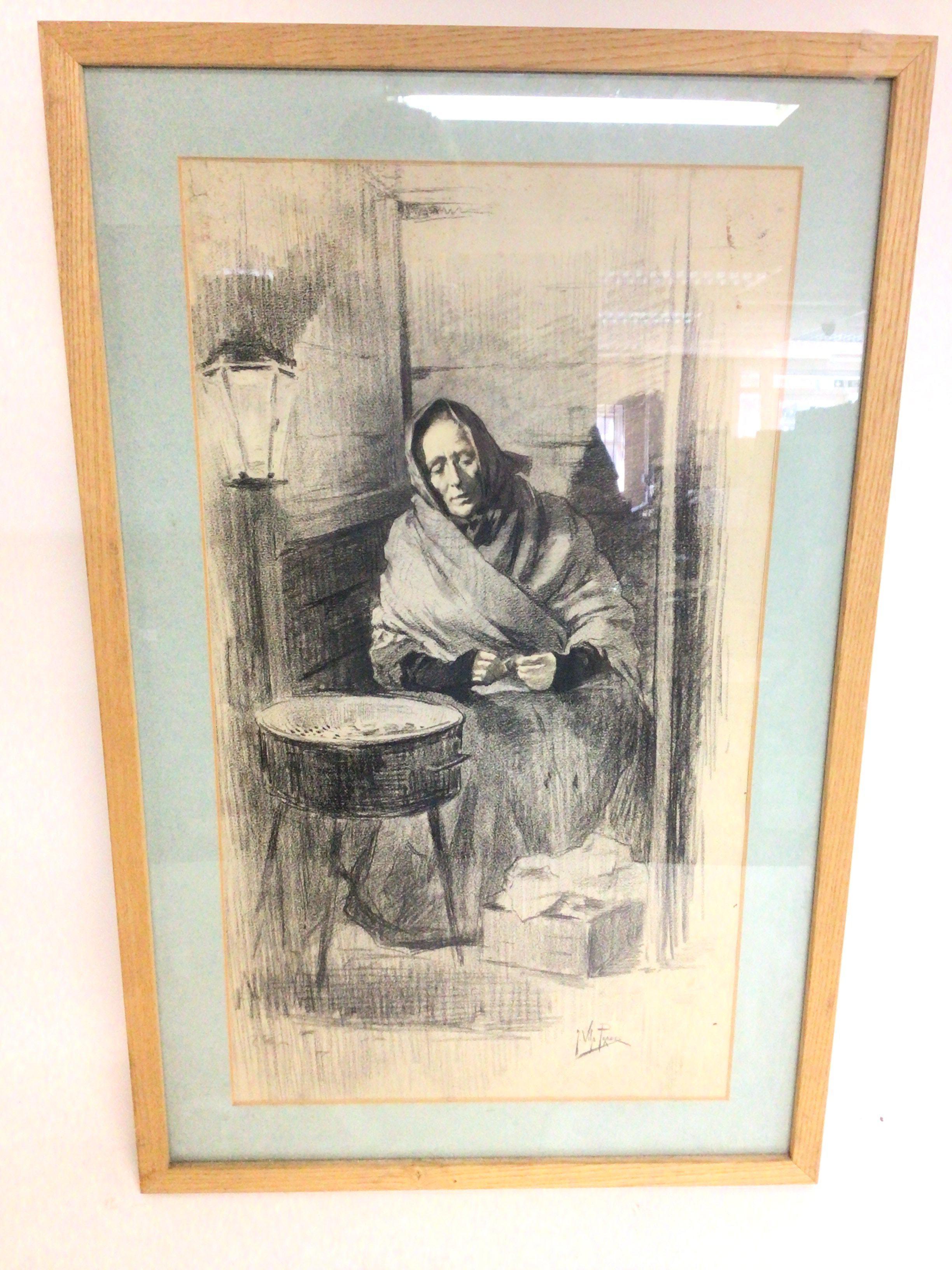 A framed charcoal sketch of a seated woman by Vila