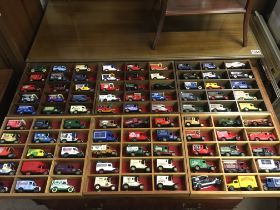 6 display frames with assorted die cast vehicles from days gone. Postage C