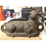 A Victorian iron lamb chocolate mould. This item c