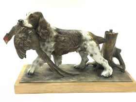 A cold painted dog & pheasant table lighter, posta