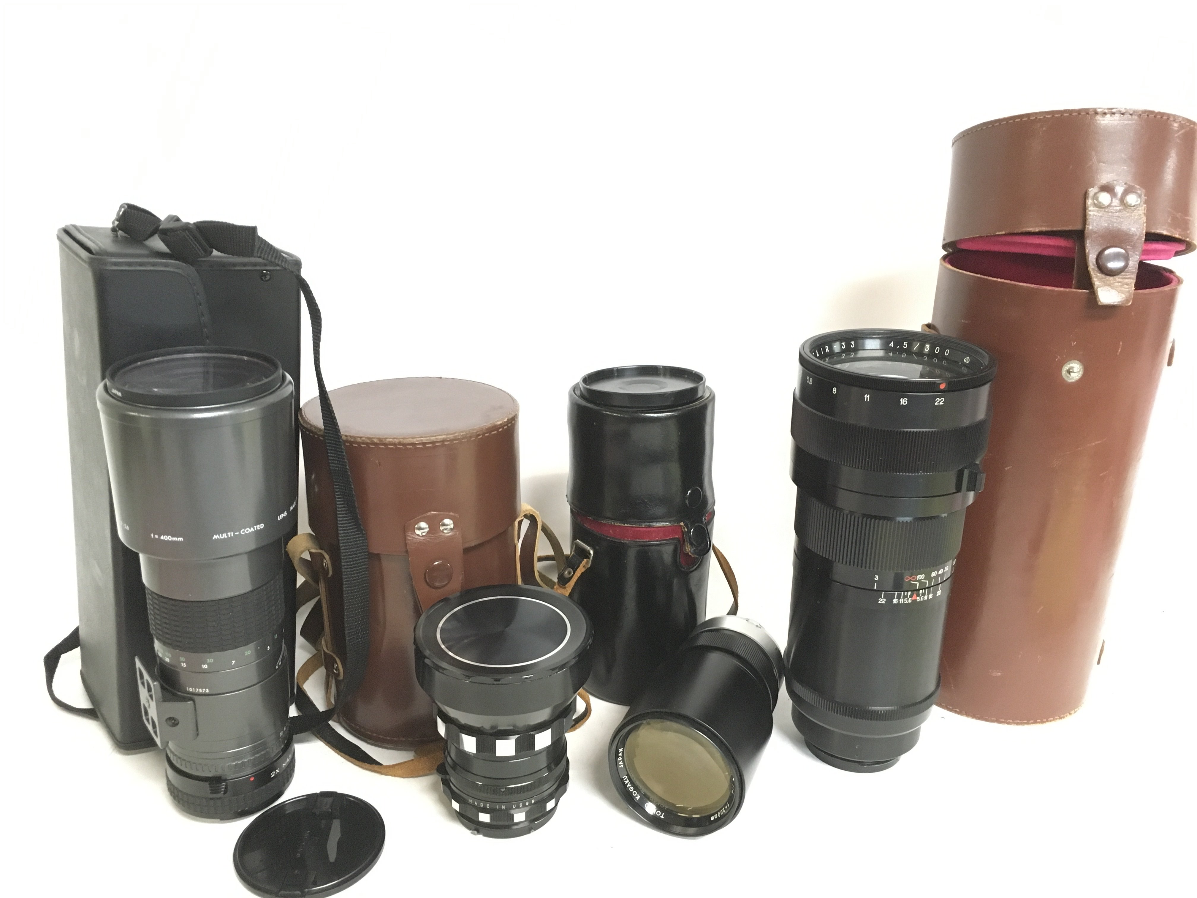 A collection of camera lenses including soviet USS